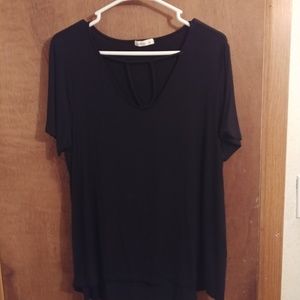 Black basic tee with cross in front